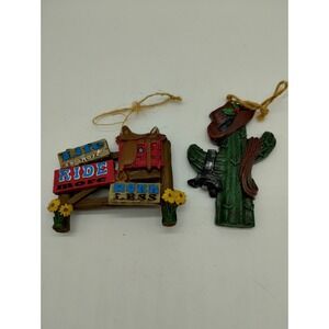 Set Of Two South Western Christmas Ornaments Resin Cactus Saddle Ride More Work